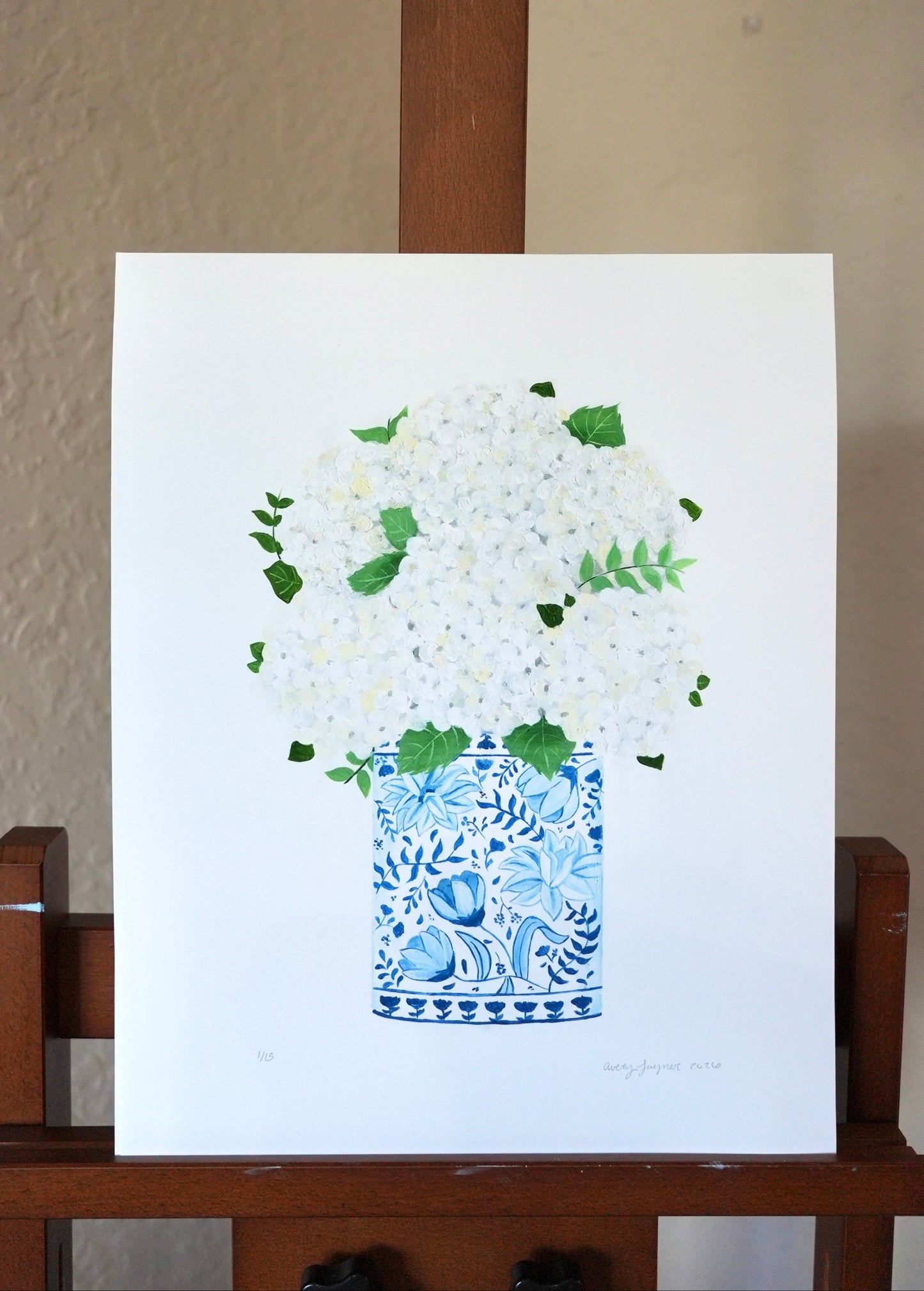 Art print of a blue and white floral pot on a white background