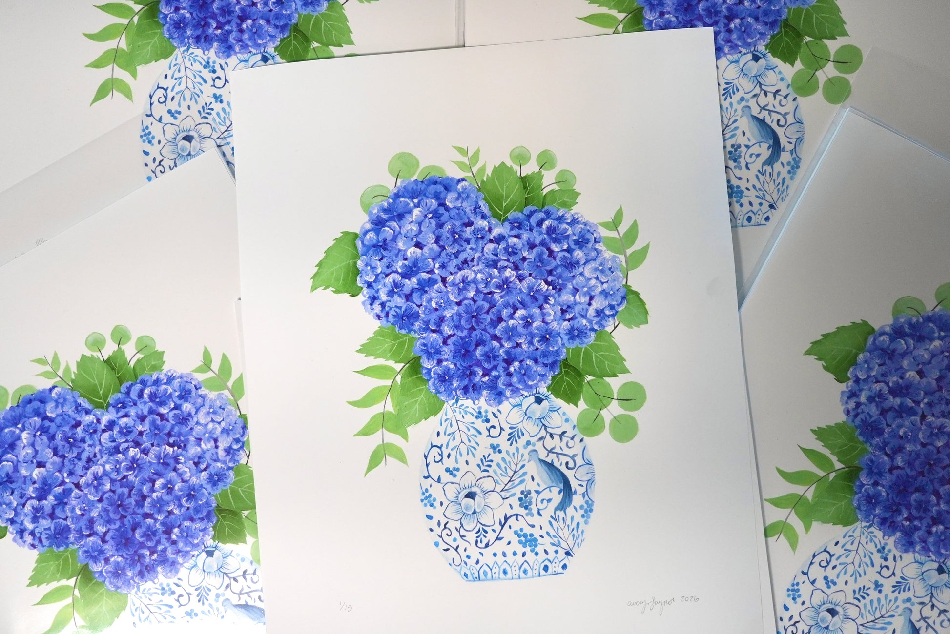 Decorative paper with blue floral design on a white background