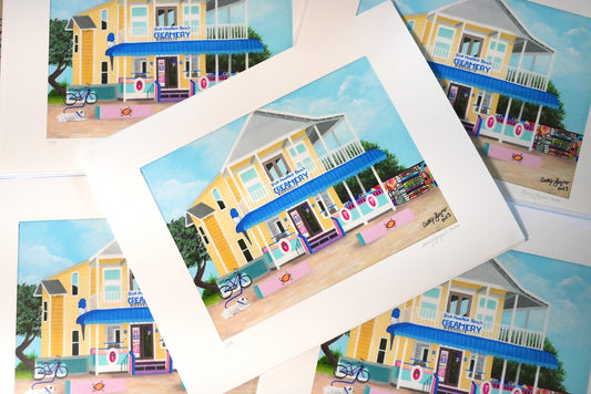 Collection of prints featuring a colorful building with a blue awning.