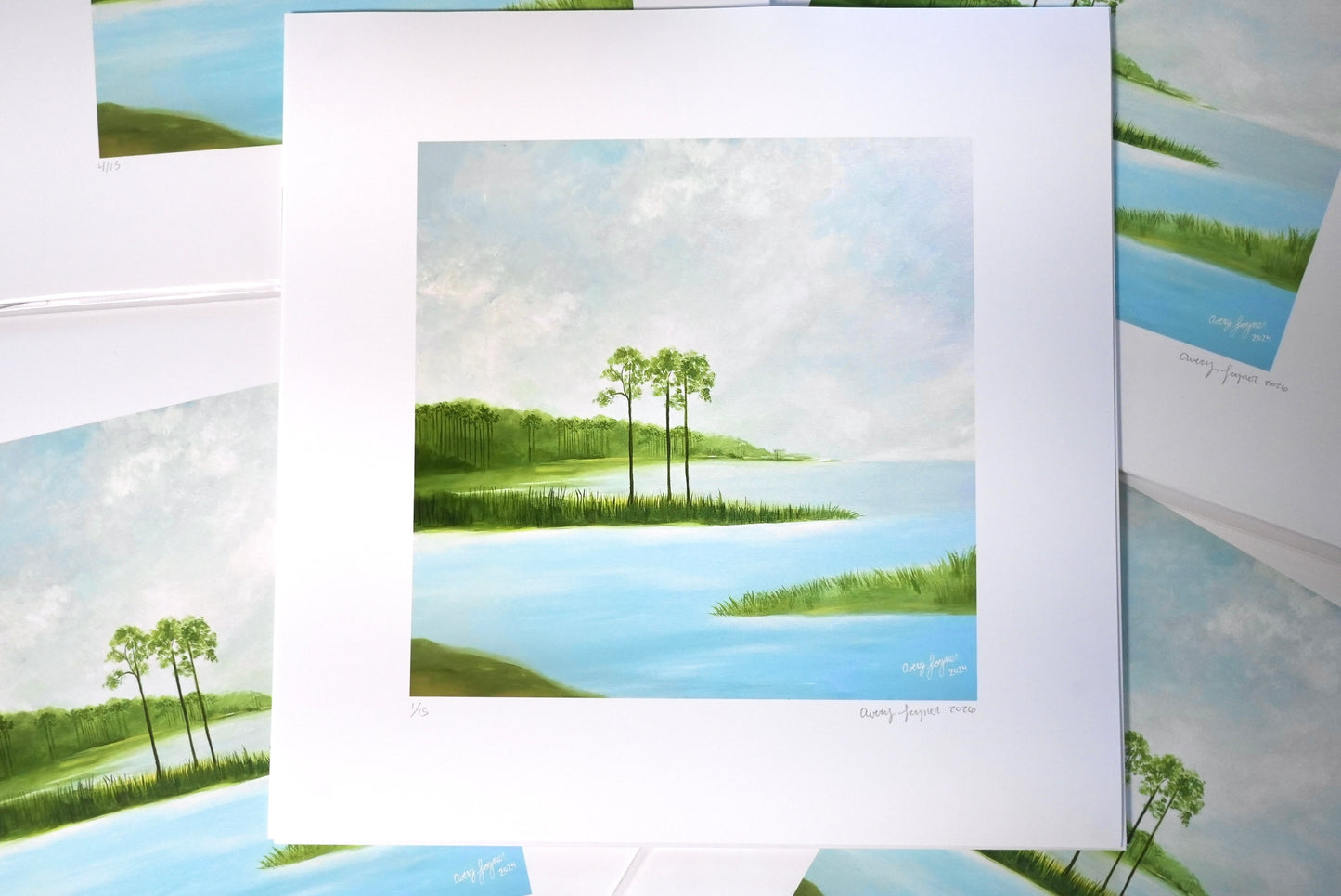 Set of landscape prints with trees and water on a white background
