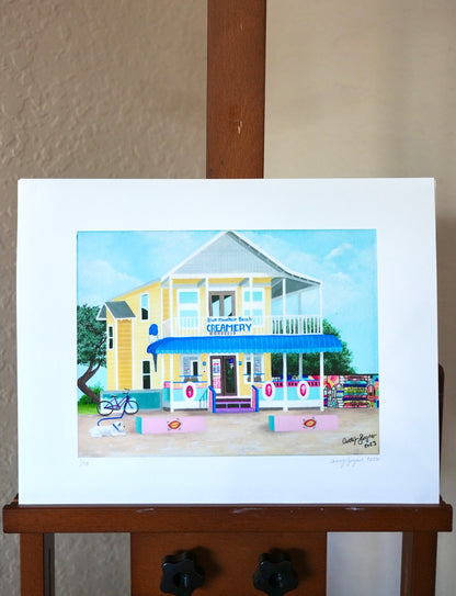 Art print of a yellow building with a blue awning on a white background