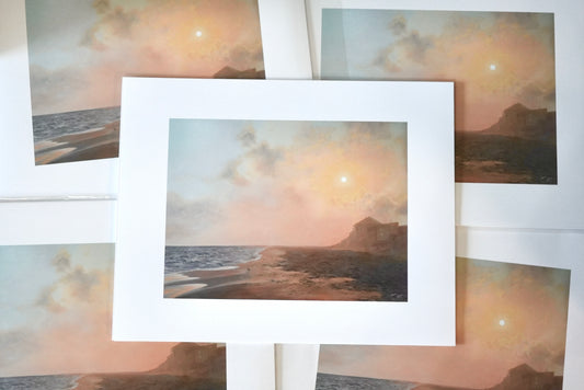 Collage of landscape prints with a focus on a sunset over water scene.