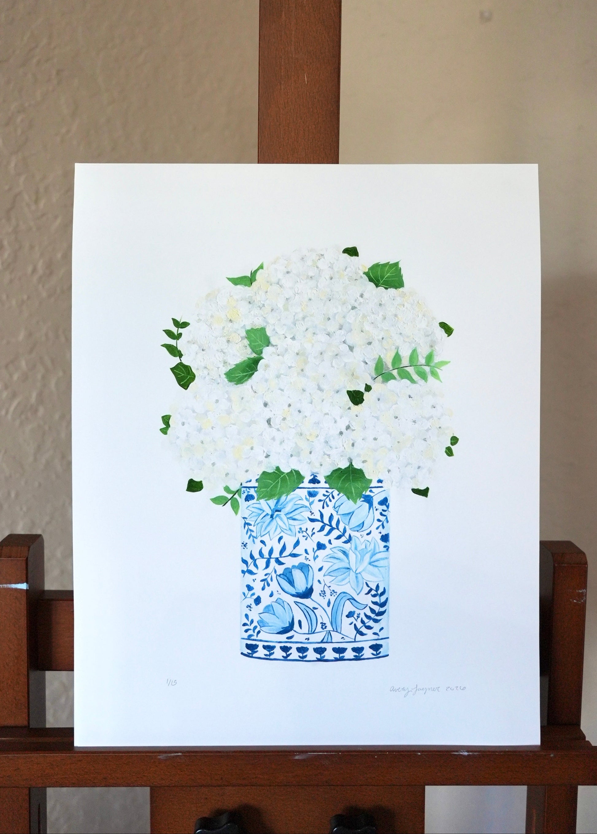 Art print of a blue and white floral pot on a white background